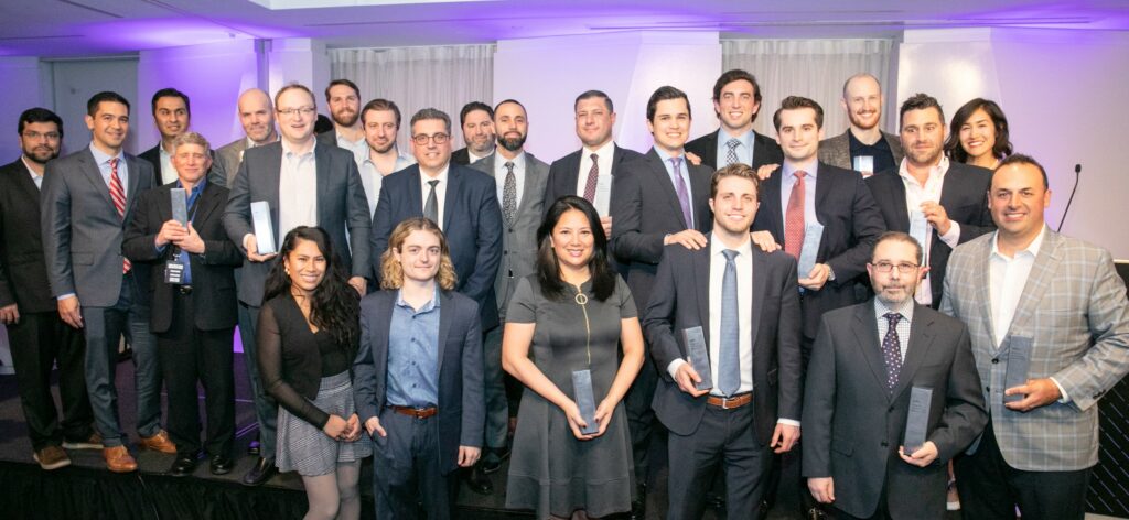 All winners image at the 2022 HFM US Technology Awards, featuring EDS and other award recipients.
